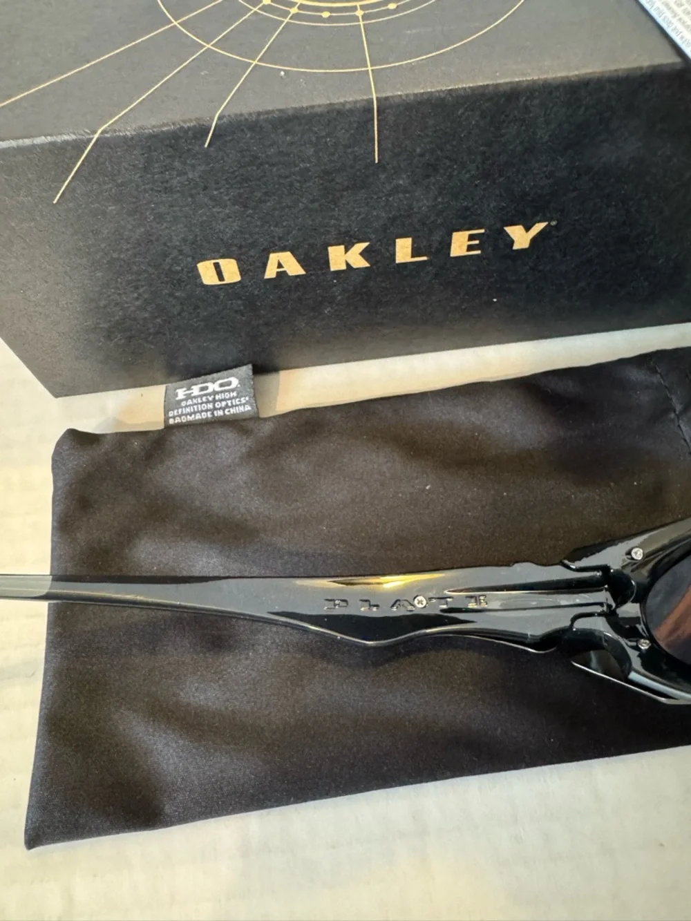 Oakley Black Sunglasses with Orange Mirror Lenses